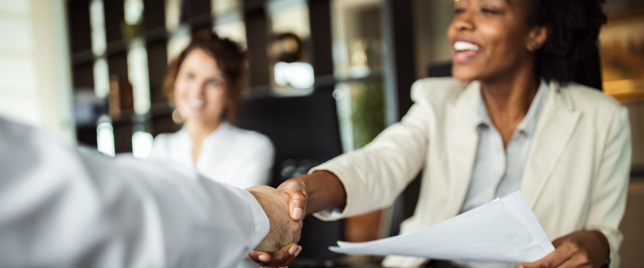 Common types of sureties and how they work Happy Woman Shaking Hands With Man